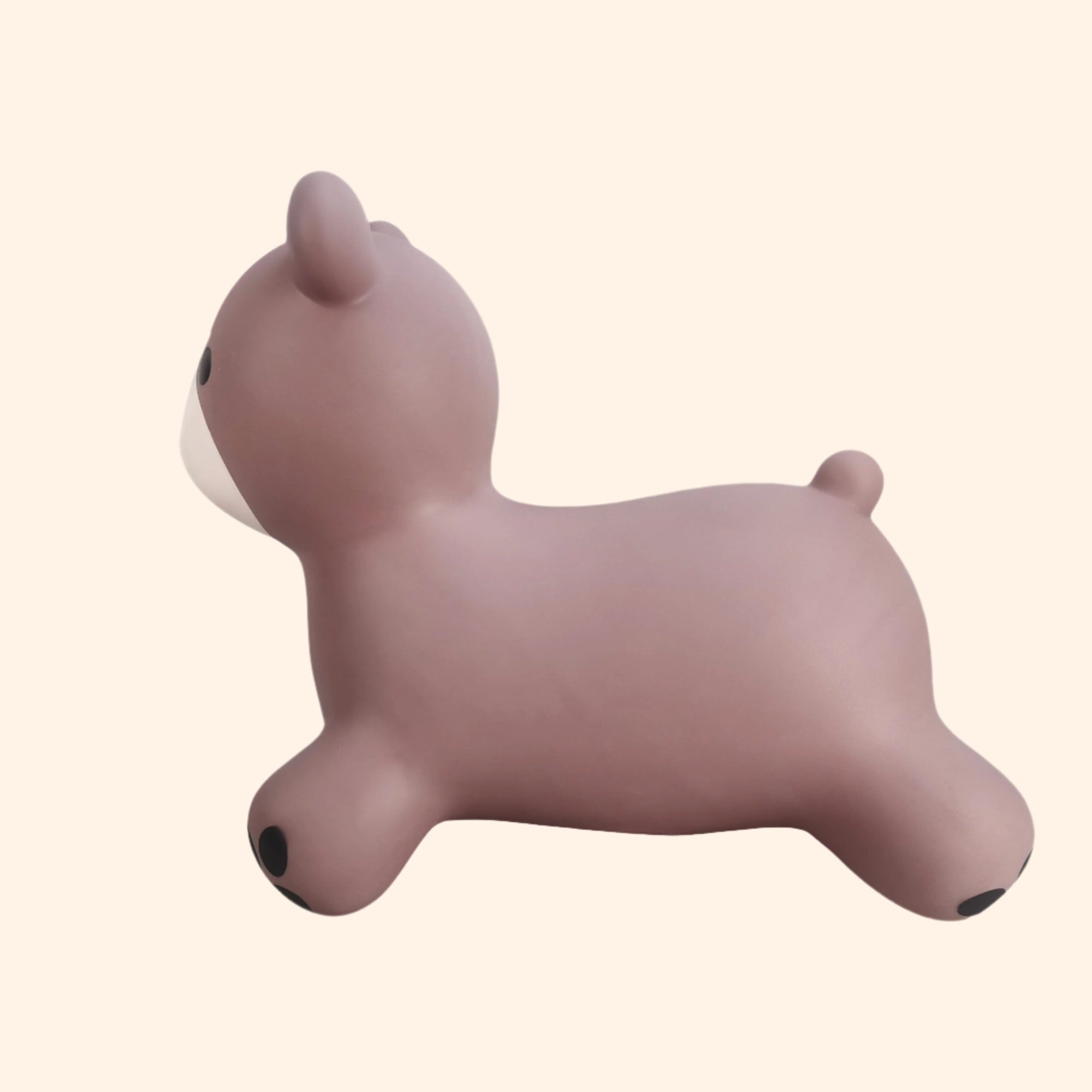 Side view of Maya bouncing bear toy in rosy taupe with black accents – Find That Hippo