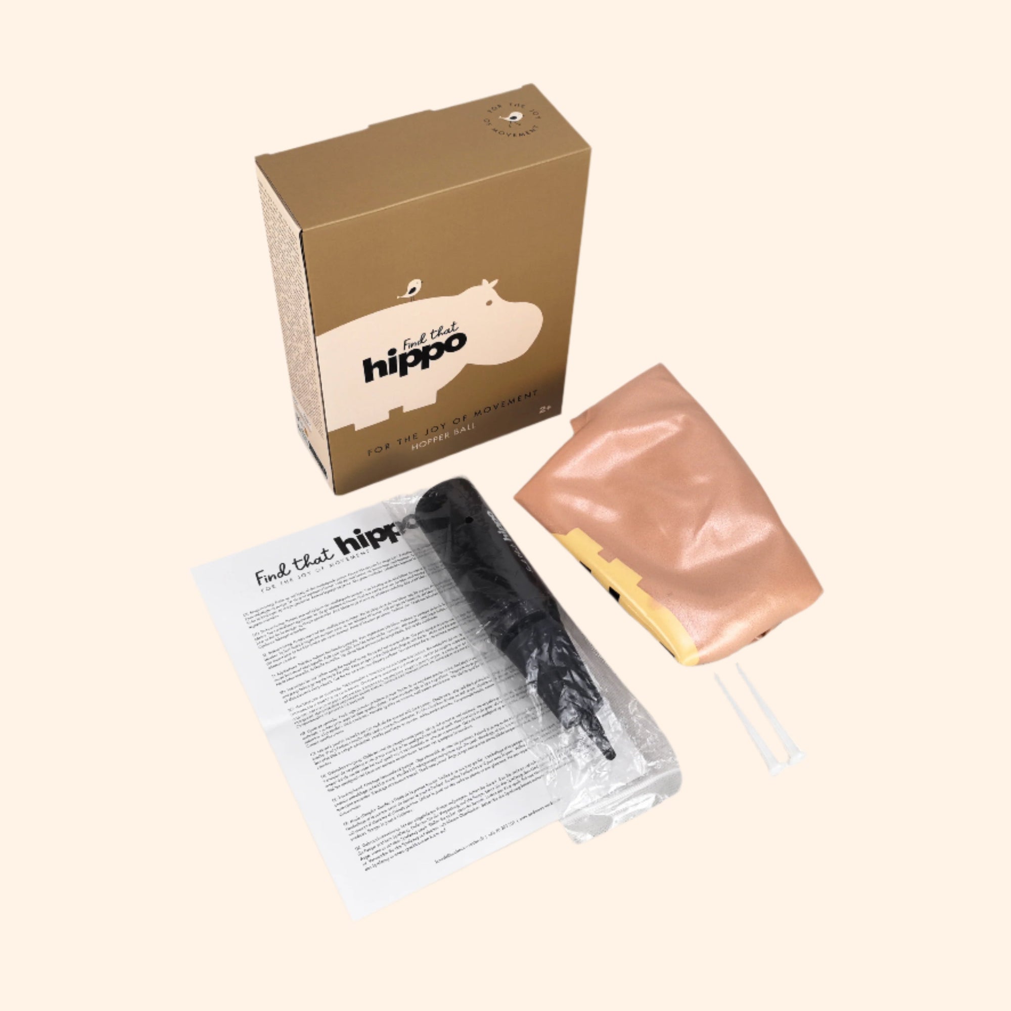 Packaging set of the muted orange bouncing ball with branded box, manual, and pump – Find That Hippo