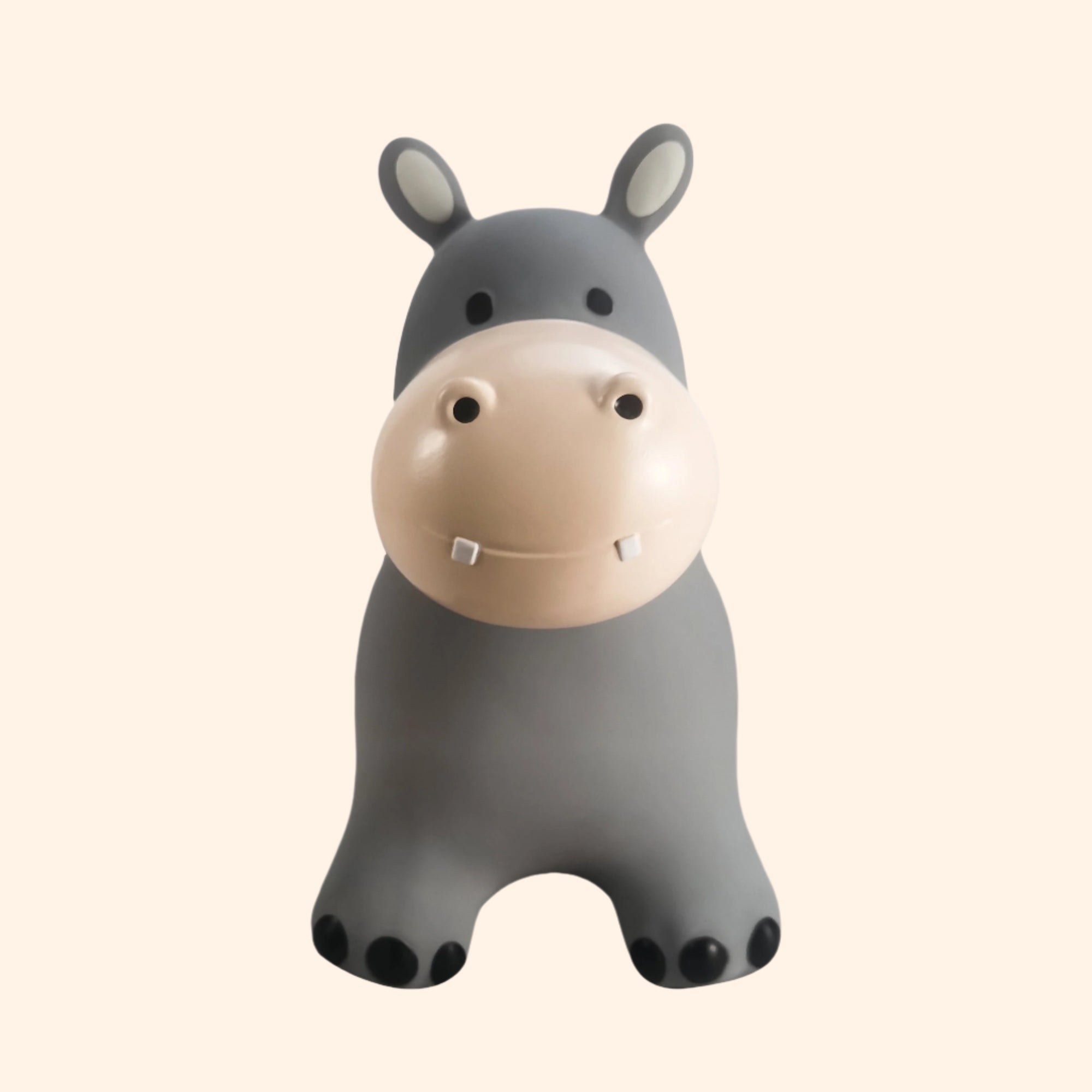 Front view of Holger bouncing hippo toy in light grey with black eyes and white muzzle – Find That Hippo