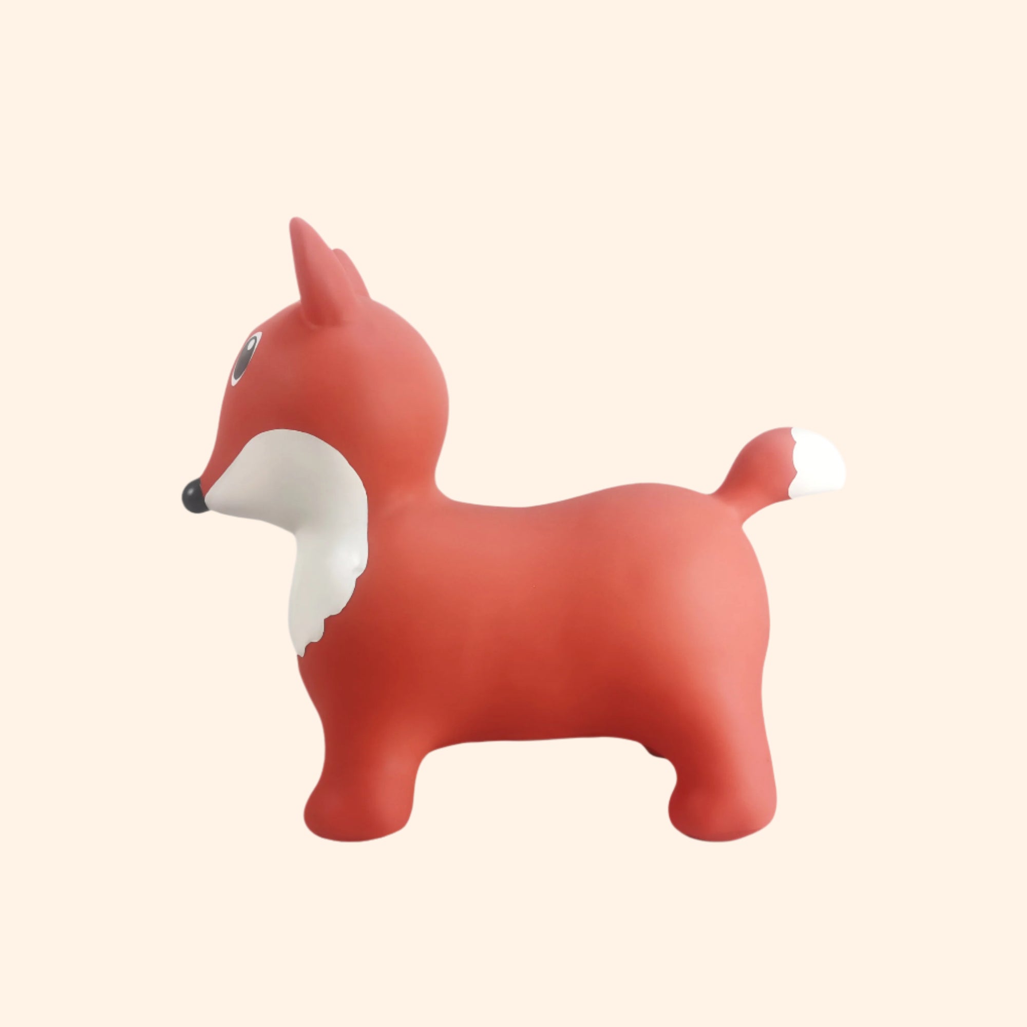 Side-back view of Lela the bouncing fox toy showing tail and ear details – Find That Hippo