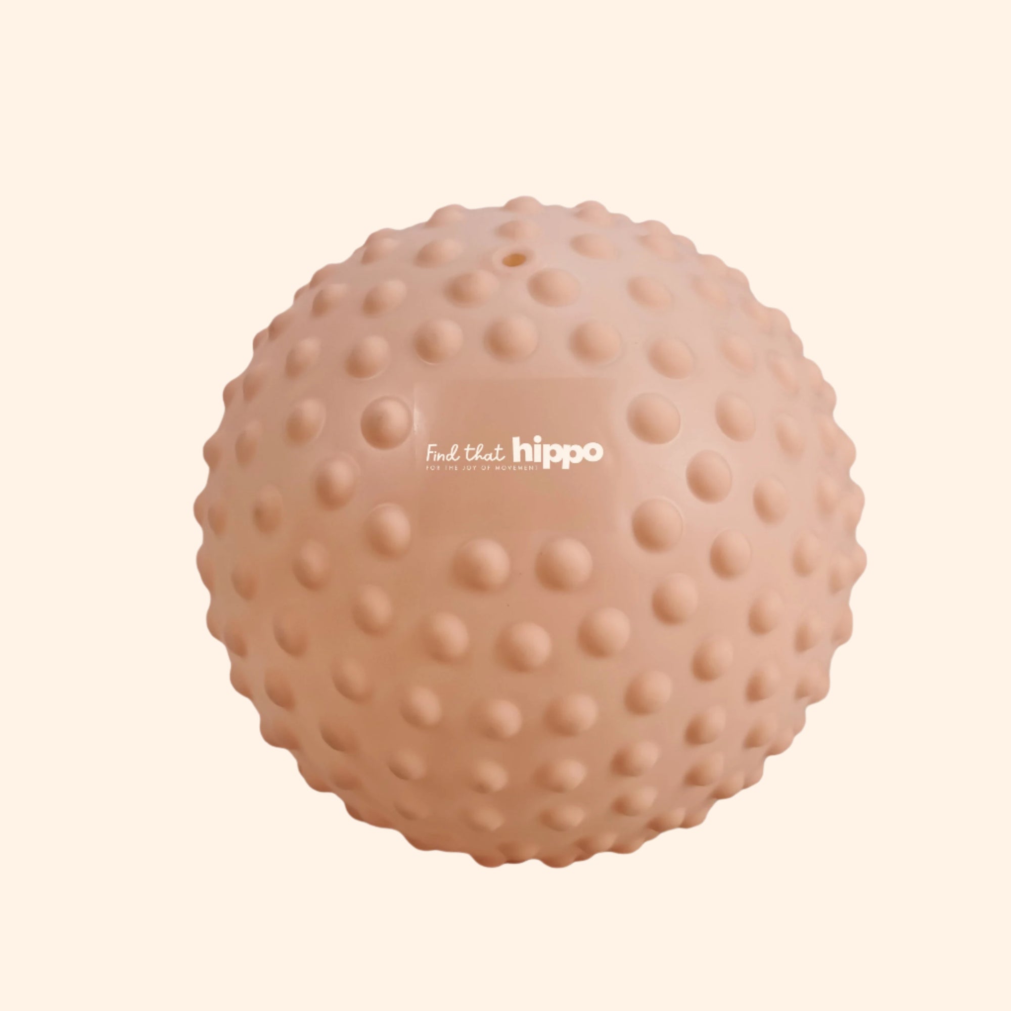 Large dusty pink sensory ball with tactile bumps shown on a neutral background – Find That Hippo