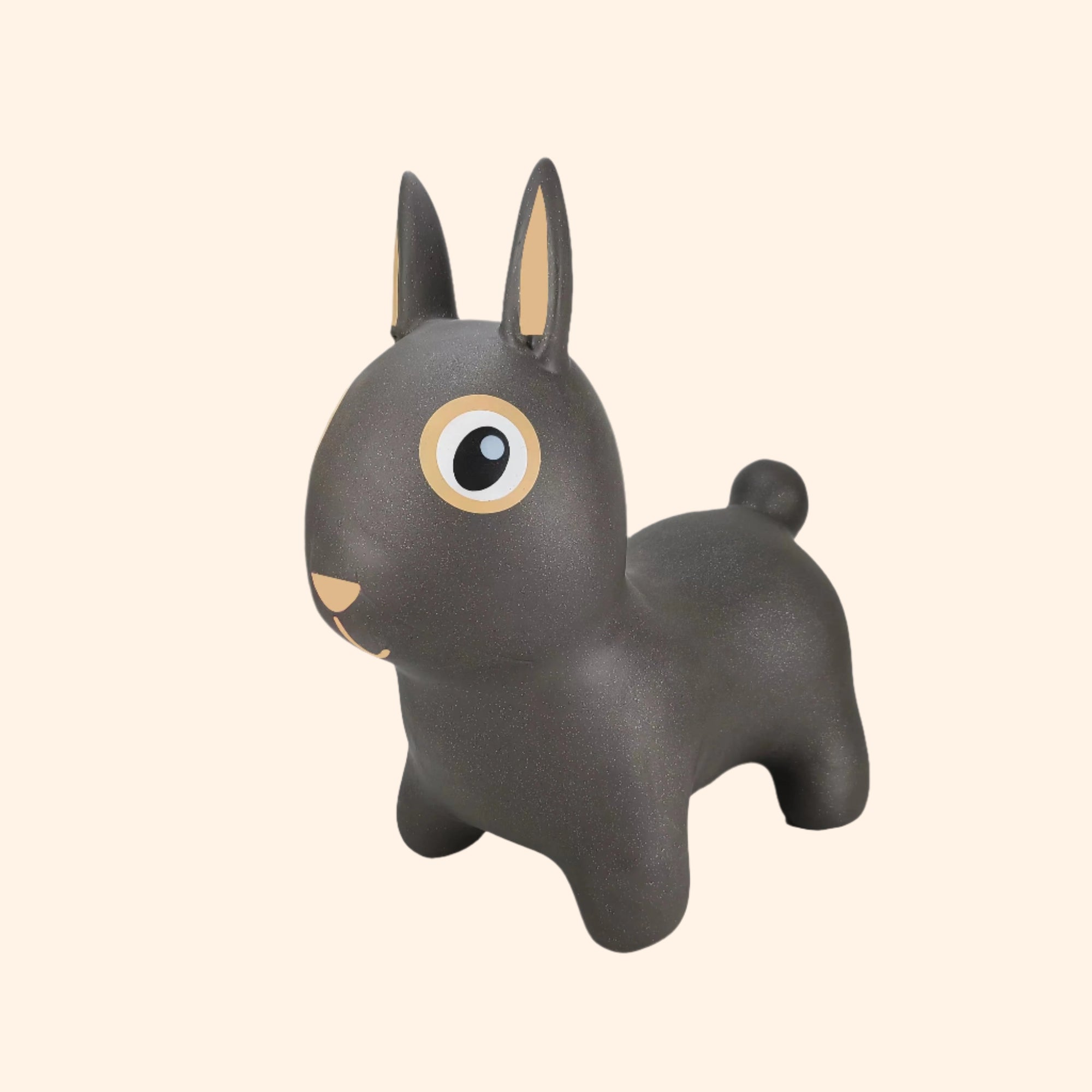 Front angle of Thumper bouncing bunny toy in dark grey with white, black, and beige details – Find That Hippo